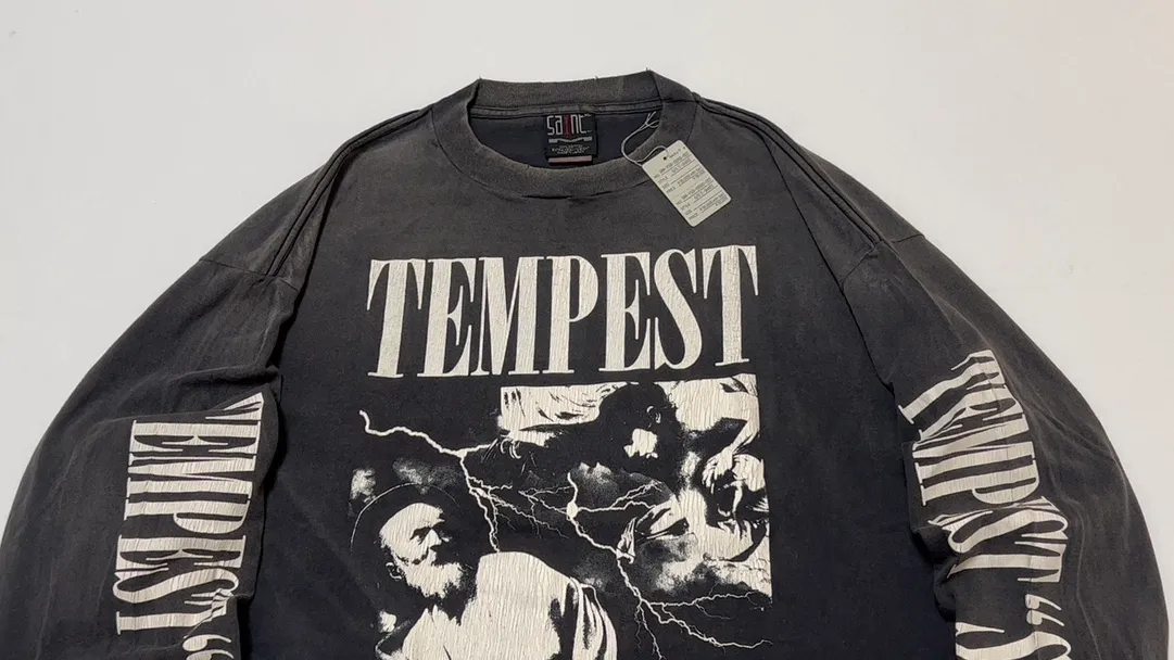 SAINT Mxxxxxx LS TEE/TEMPEST/BLK 'TEMPEST SAINT' Storm Religious Saints Cracked Retro Vulcanized Heavy Wash Long Sleeves Washed Black S-XL Assute Dyeing Multi-bit Horse Fading Craftsmanship Grinding and Hanging Holes Full of Old Feeling Top Printing Craftsmanship Purchasing Level